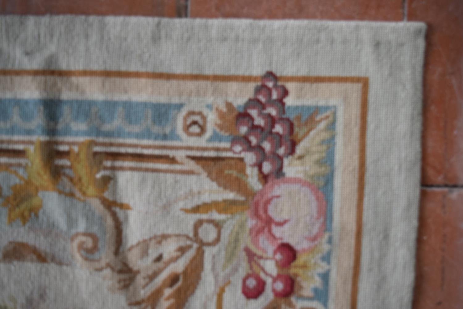 A handmade needlepoint rug with double floral central medallions contained by flower and vine - Image 3 of 4
