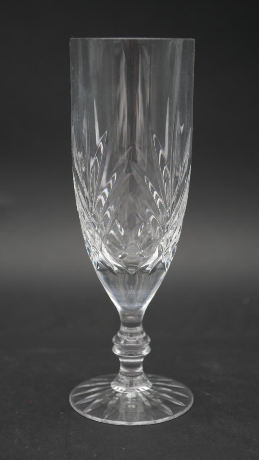 A collection of sixteen cut crystal glasses. Including a set of four foliate design wine glasses, - Image 5 of 11