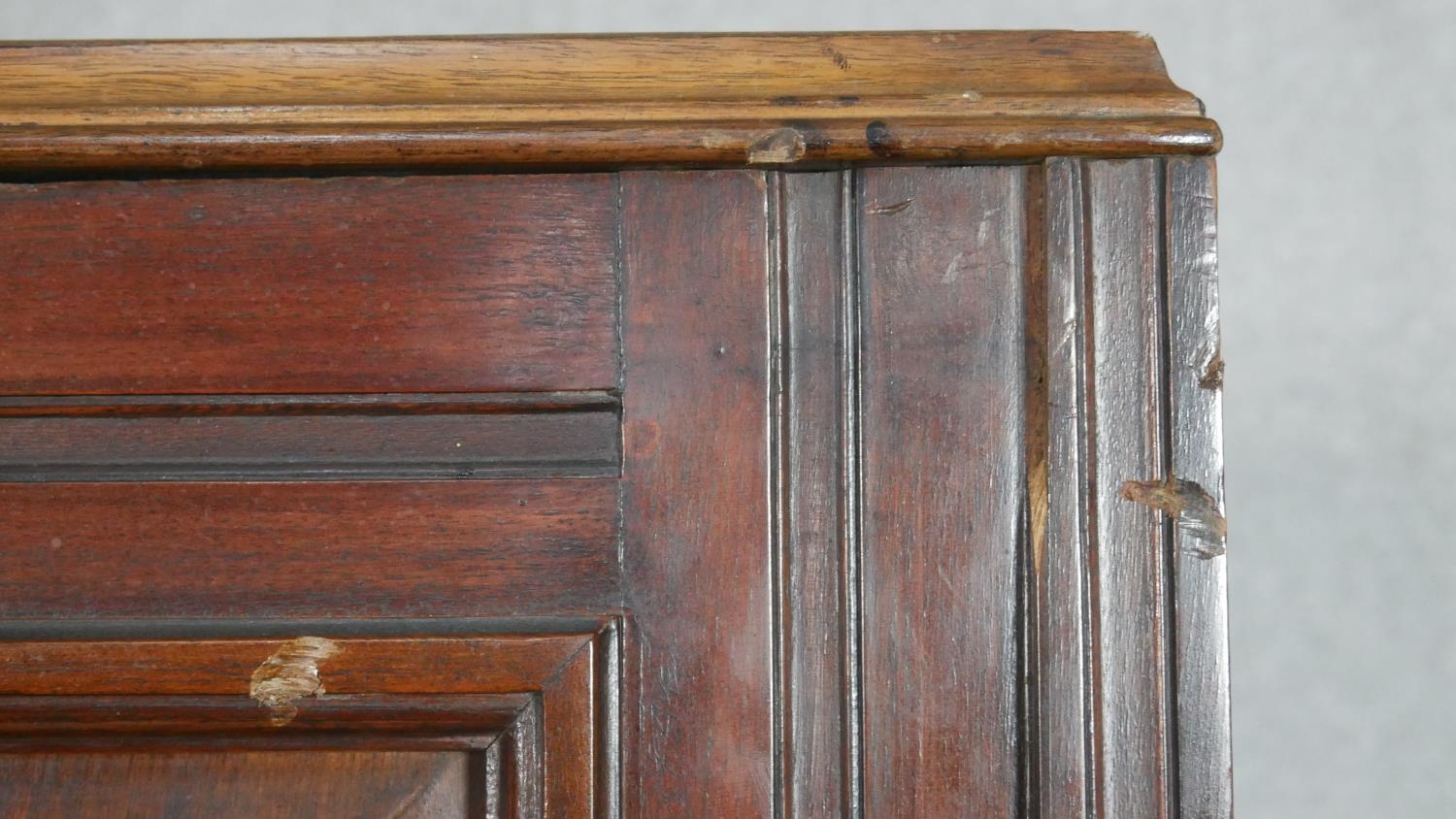 A pair of Victorian carved walnut hall cupboards with panel doors enclosing hanging space. H.183 W. - Image 8 of 10