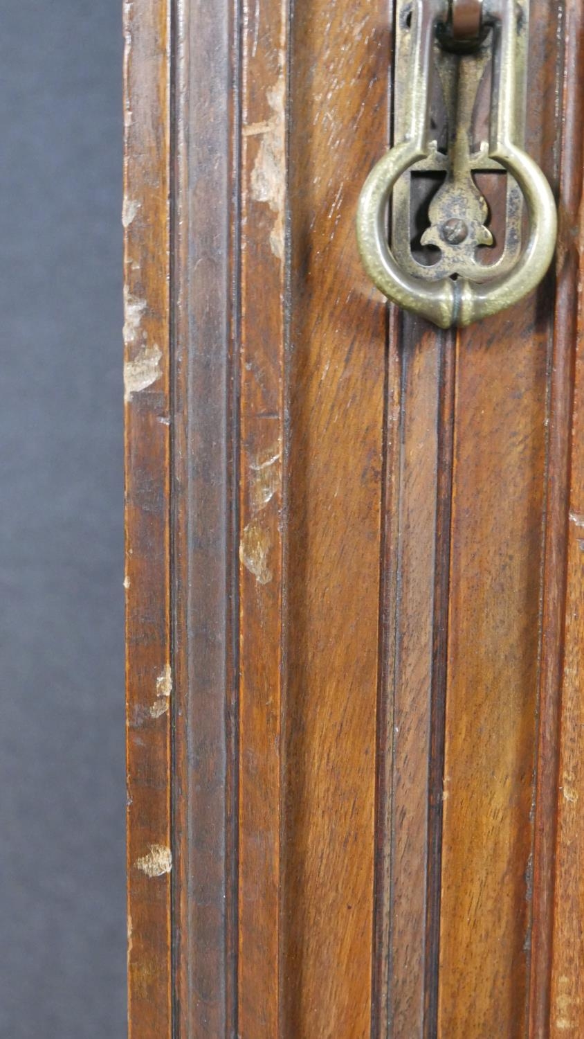 A pair of Victorian carved walnut hall cupboards with panel doors enclosing hanging space. H.183 W. - Image 9 of 10