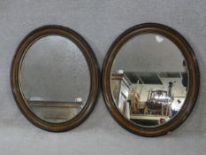 A pair of C.1900 mahogany framed wall mirrors with gilt slip and original bevelled plates. H.72 W.