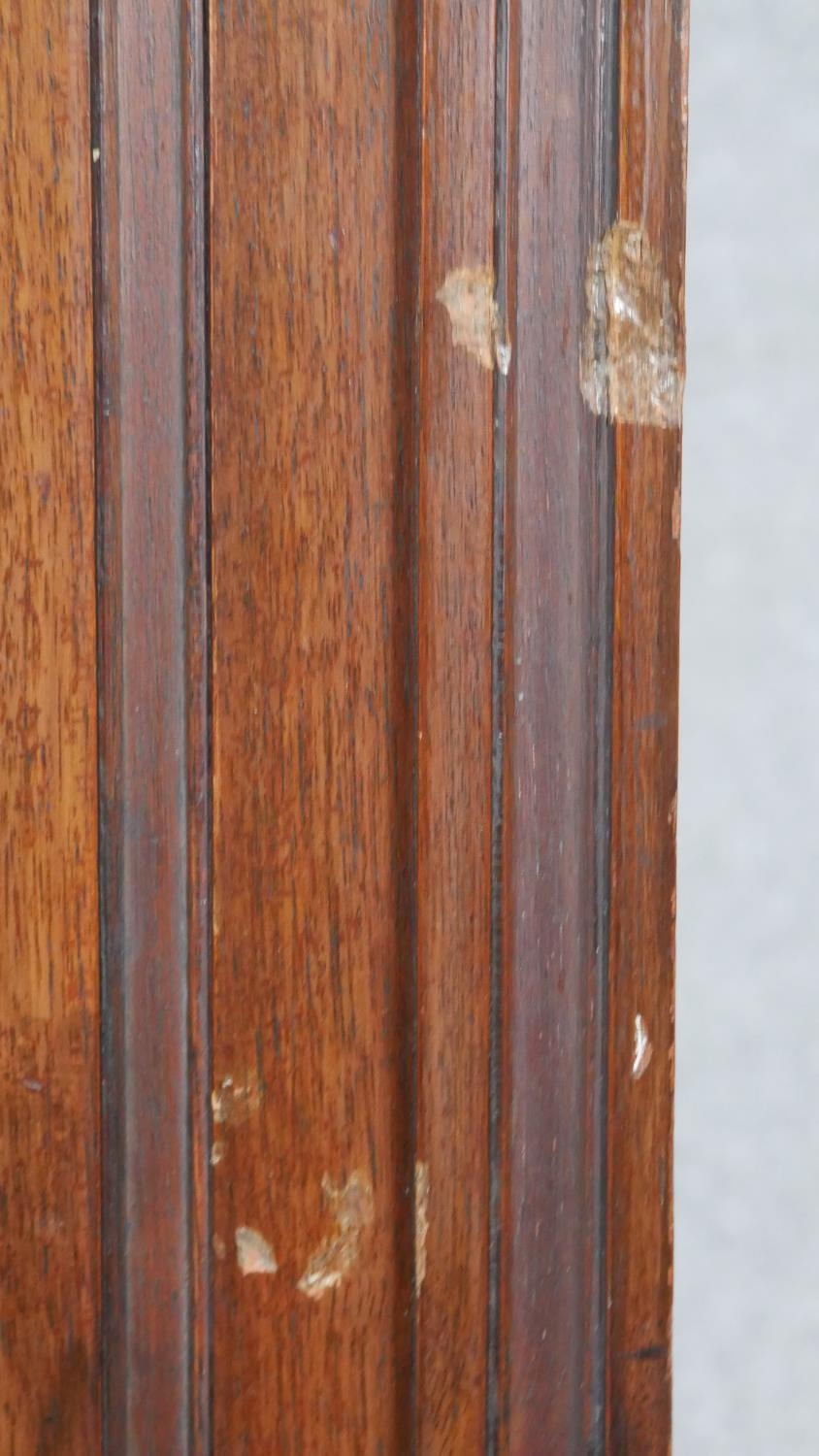 A pair of Victorian carved walnut hall cupboards with panel doors enclosing hanging space. H.183 W. - Image 7 of 10