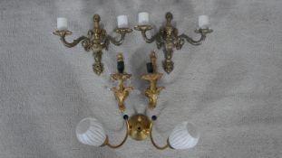 A pair of metal twin branch wall sconces, a pair of gilt metal Rococo sconces and a vintage twin