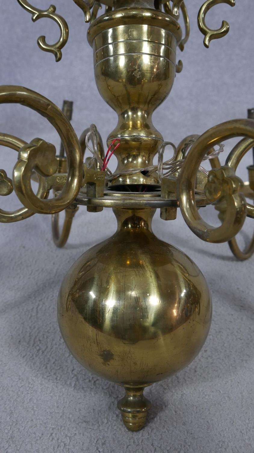 A Dutch style brass six branch chandelier with double headed eagle finials and scrolling arms. D. - Image 6 of 7