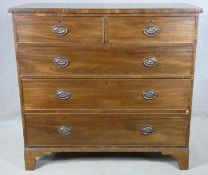 A Georgian mahogany chest of two short above three long drawers on bracket feet. H.93 W.109 D.51cm