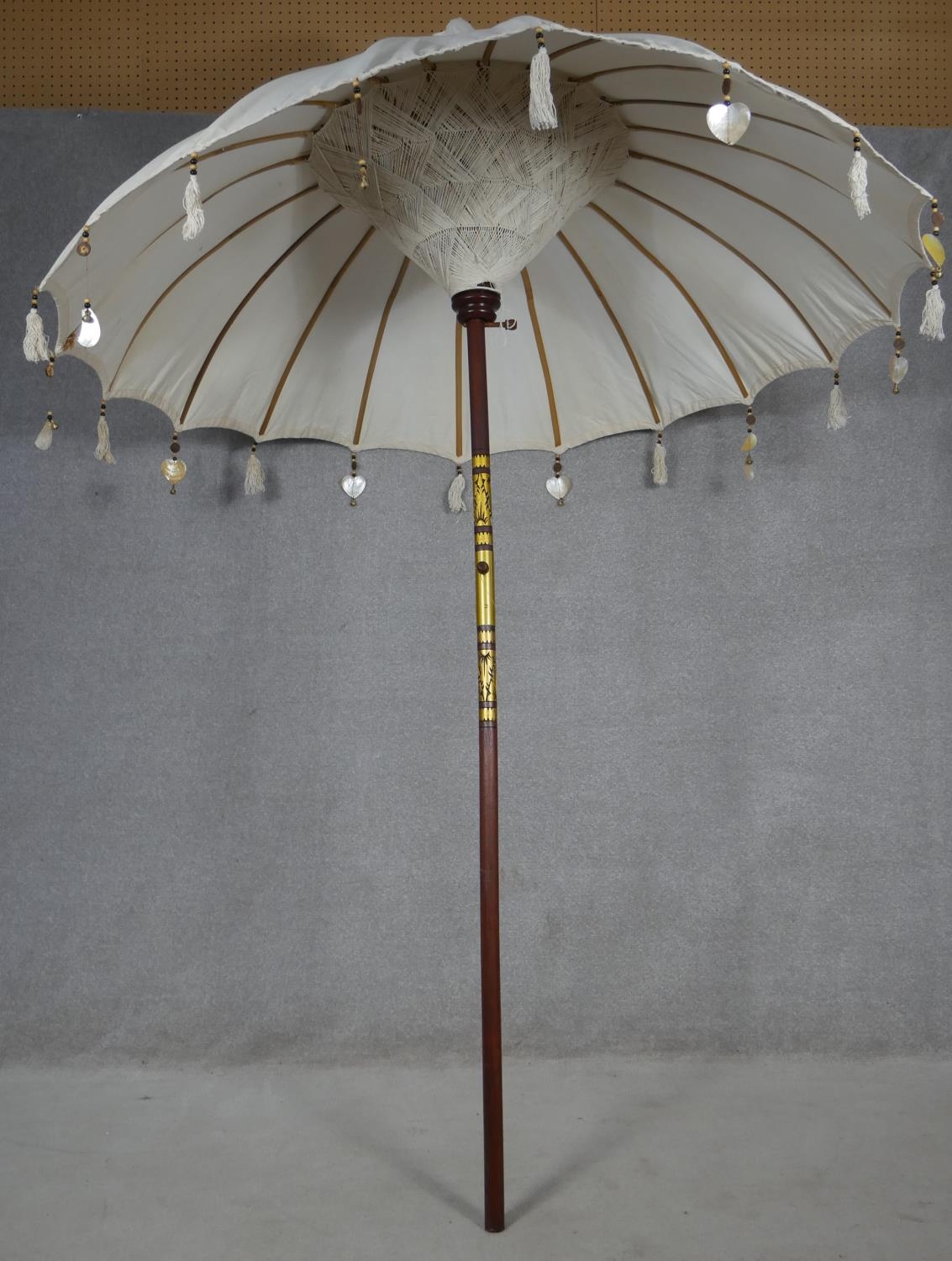 An Indian tall parasol with carved and gilt painted and decorated finial and stem and heart shell - Image 3 of 6