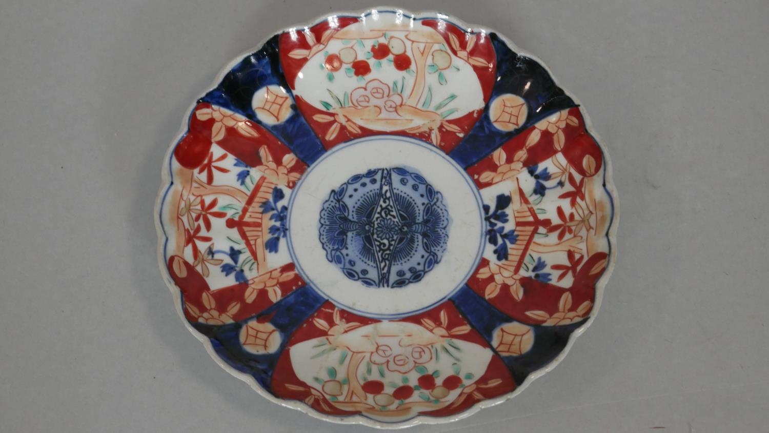 An Imari style plate and a similar vase with flared neck along with a pair of Famille Vert bulbous - Image 2 of 9