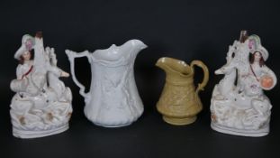 A Portmeirion Parian water jug with relief decoration, a 19th century Ridgeway jug and a pair of