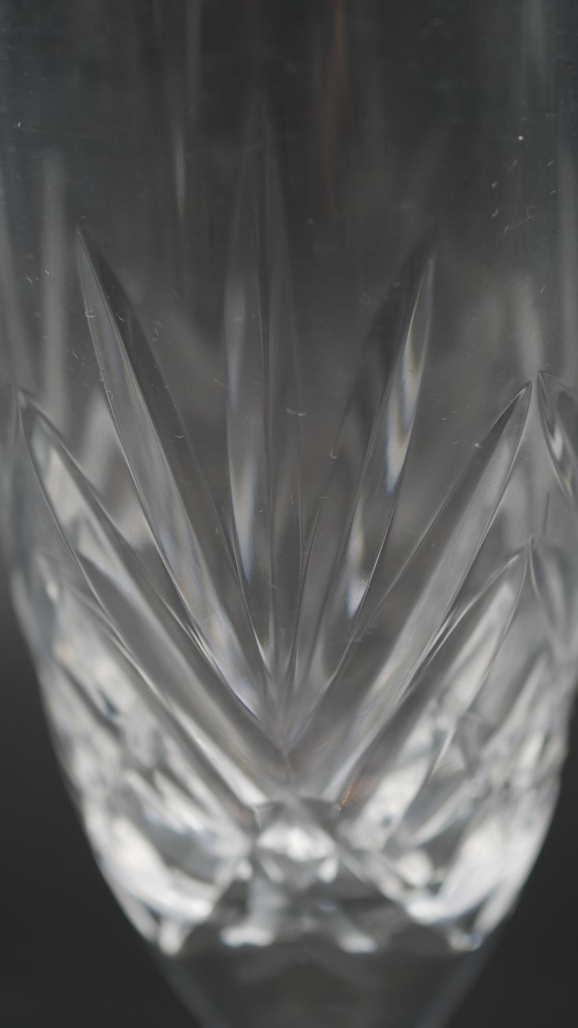 A collection of sixteen cut crystal glasses. Including a set of four foliate design wine glasses, - Image 6 of 11