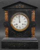 A late 19th century slate and marble mantel clock with architectural pediment and enamel white