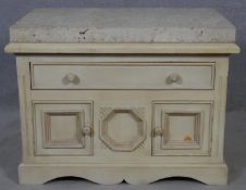 A Continental painted side cabinet with limestone slab top on shaped bracket feet. H.67 W.91 D.61cm