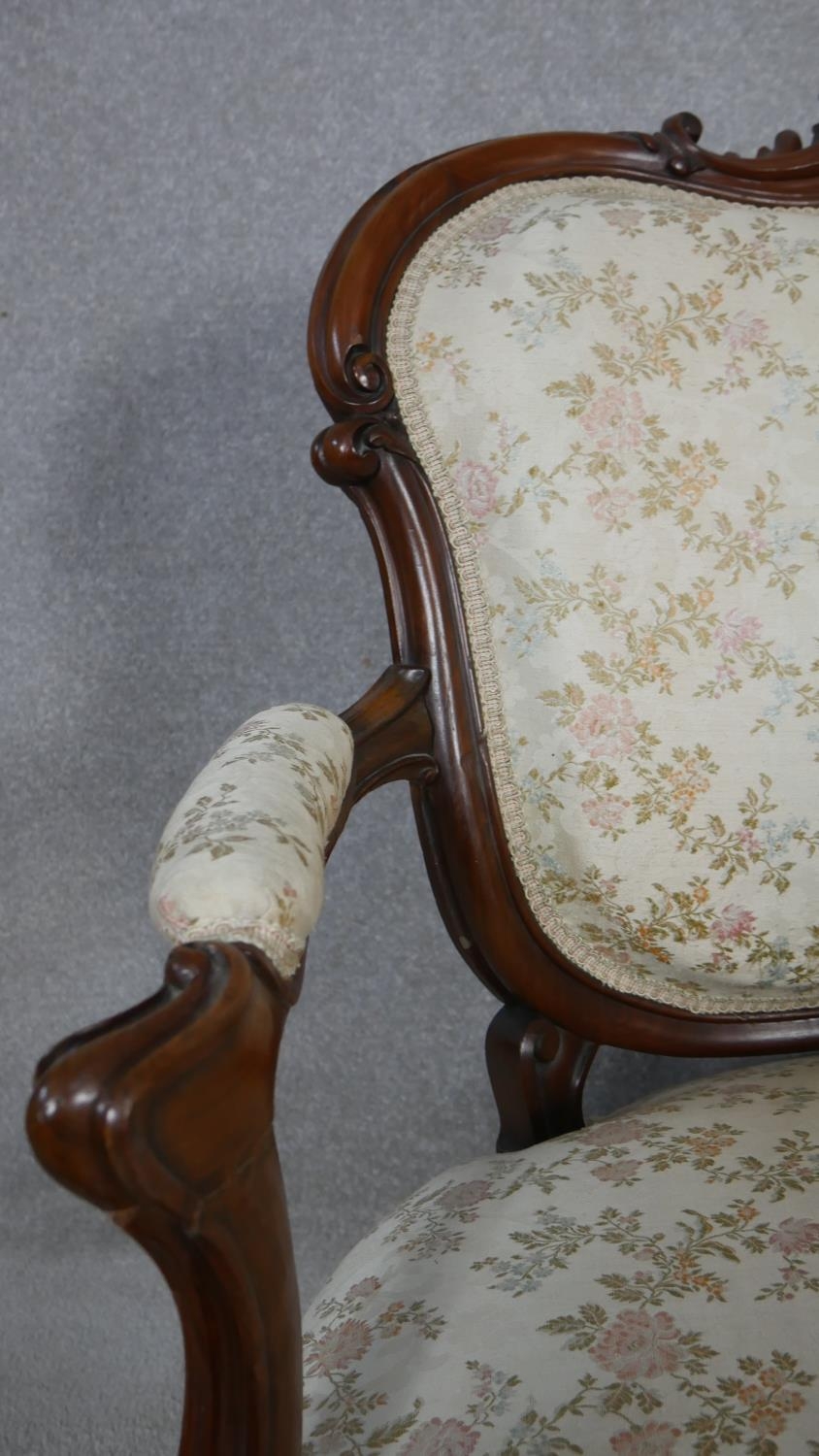 A 19th century carved mahogany canape in floral upholstery with four cabriole front supports. H.99 - Image 4 of 8