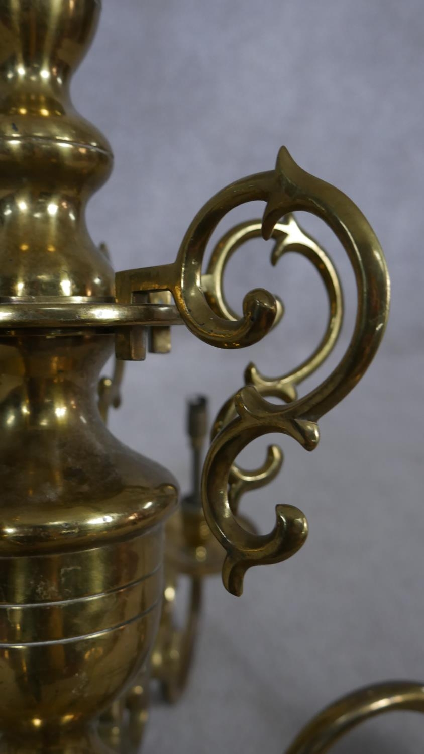 A Dutch style brass six branch chandelier with double headed eagle finials and scrolling arms. D. - Image 4 of 7