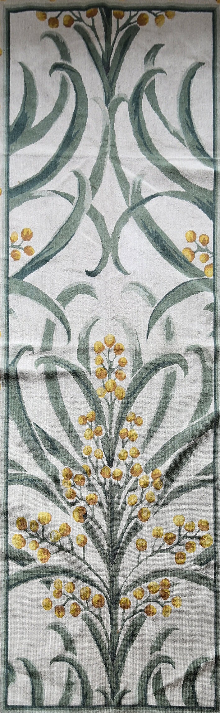 A needlepoint rug with a stylised scrolling flowering mimosa design to the central field and border. - Image 2 of 4