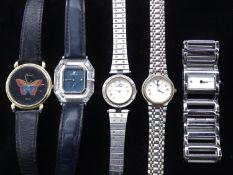 A collection of five ladies watches. To include a Swarovski 'Crystal Time' ladies watch with blue