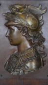 A bronze relief panel, profile portrait of Perseus on oak panel. H.58 W.39.5cm