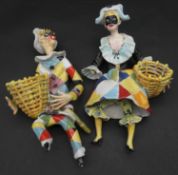 Two vintage ceramic hand painted harlequin figures, male and female with baskets. H.36cm
