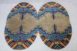 A pair of mid century rugs with Art Deco style cloud, sunburst and rainbow motifs. H.150 W.90cm