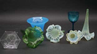 A collection of coloured and etched glass and uranium glass epergnes along with a coloured liquor