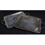 A silver plated twin handled serving tray with gadrooned edging along with a similar example. H.48