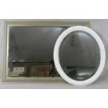 Two contemporary bevelled glass wall mirrors. H.104 W.74cm