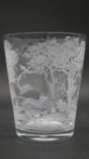 An antique clear glass etched tumbler. Depicting a hunting scene with stag, dog and trees. Makers