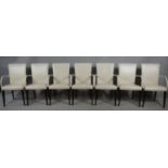 A set of seven contemporary Poltrona Frau Vittoria model dining armchairs in leather upholstery on