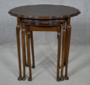 A mid century burr walnut nest of tables in the Queen Anne style. H.58 L.59 W.41cm