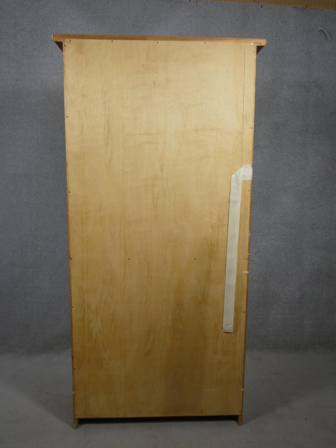 A contemporary pine wardrobe with hanging section above drawers. H.180 W.90 D.54cm - Image 6 of 17