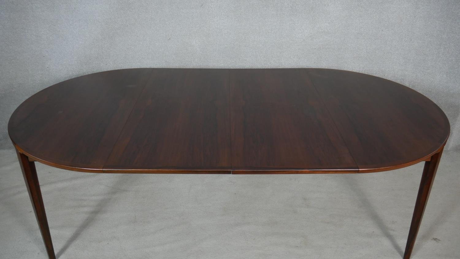 An extending dining table by Brande Mobelindustri, Denmark. H.71 L.220 W.120cm (fully extended, it - Image 3 of 5