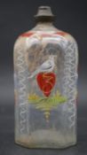 A 19th century hand painted German love potion bottle. One side painted with a dove on a heart and