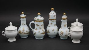 A Chinese style four piece condiment set with hand gilded decoration (chipped as photographed) along