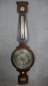 A 19th century mahogany four dial banjo barometer with silvered dial etched A Martinelli. H.105cm (