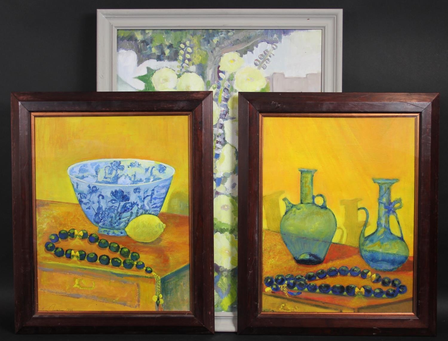 A pair of oils on board, still lives, and an oil on canvas, a still life of flowers, each signed