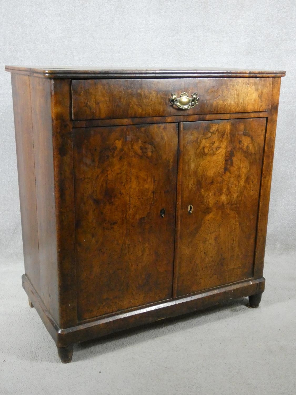 A late 19th century Continental burr walnut chiffonier with frieze drawer above panel doors on - Image 2 of 15