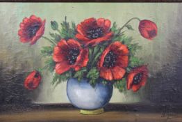 An oil on board, poppies in a vase, signed de Groot, in an ornate gilt frame. H.50 W.70cm