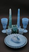 A collection of Victorian slag glass to include a pair of obelisks, a pair of goblets, miniature