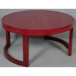 A contemporary stained and lacquered low table. H.46 D.92.5cm