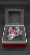 A boxed Baccarat crystal figure of two doves. Signed, stamped and labelled and with certificate. H.