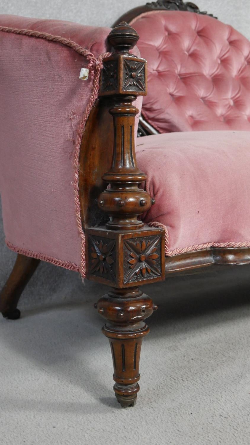 A Victorian carved walnut framed sofa in deep buttoned velour upholstery on fluted tapering - Image 3 of 6