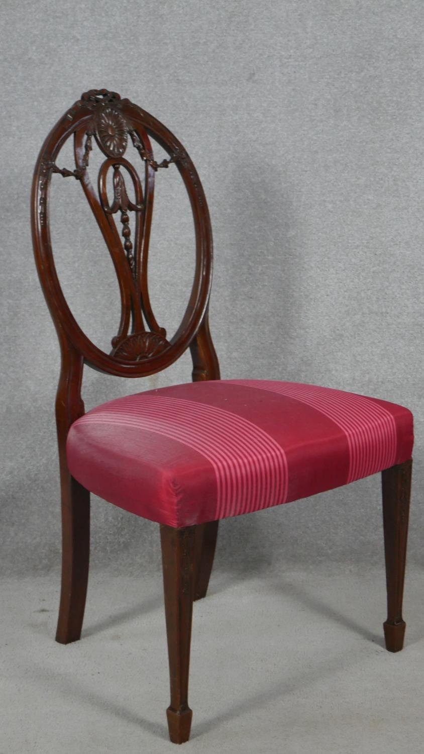 A 19th century mahogany dining chair with carved swag and ribbon detail to the back raised on square - Image 2 of 5