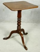 A 19th century mahogany tilt top occasional table on turned pedestal and tripod cabriole supports.