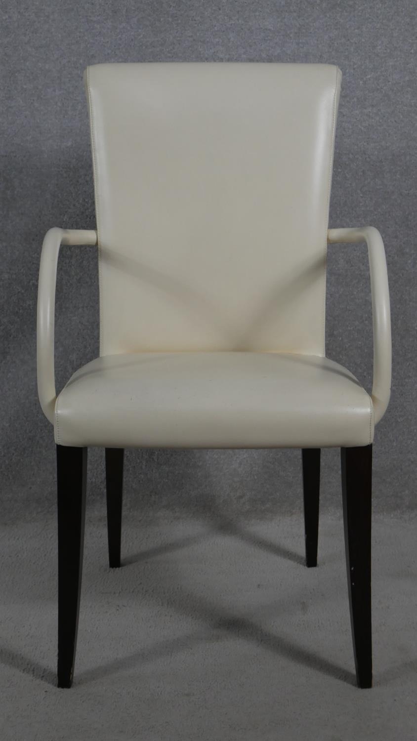 A set of seven contemporary Poltrona Frau Vittoria model dining armchairs in leather upholstery on - Image 2 of 5
