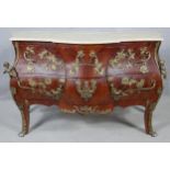 A 19th century French style kingwood bombe commode with shaped marble top and all over scrolling