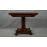 A William IV mahogany fold over top tea table on facetted pedestal quadruped base. H.72 L.48 W.92cm