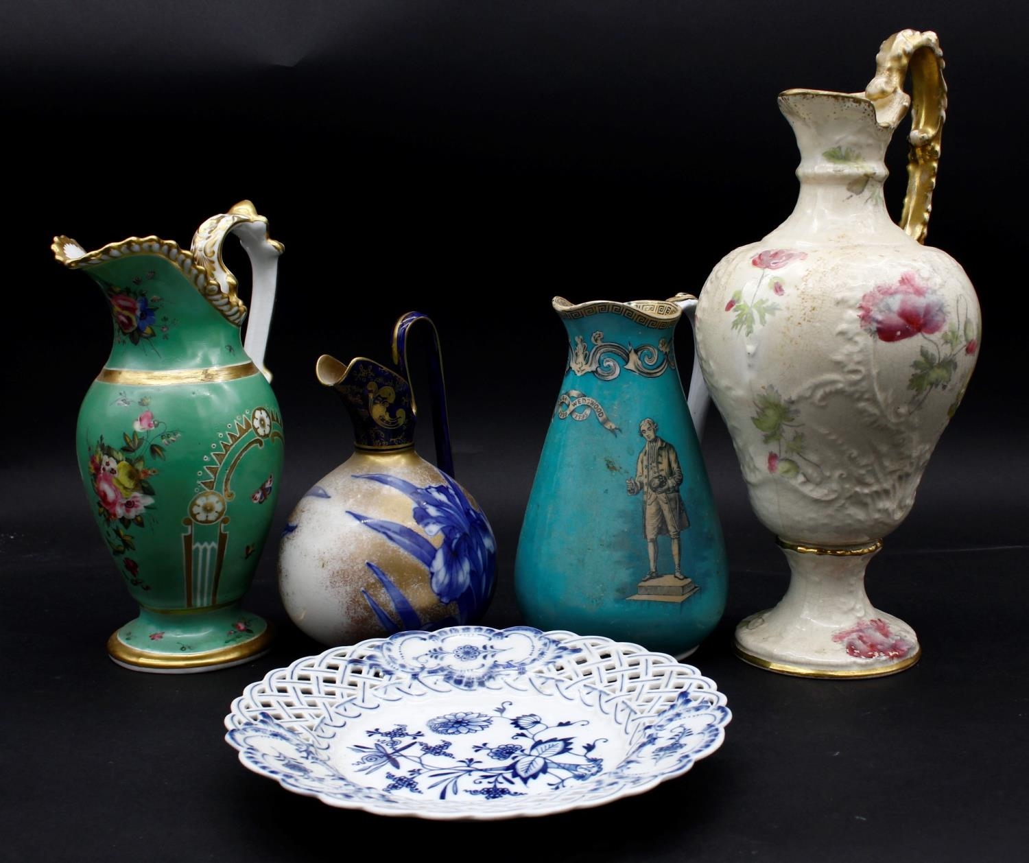 A 19th century Doulton Burslem ewer with gilt and lily decoration, three other examples and a 19th