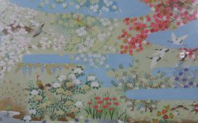 A Chinese woodblock print, exotic birds and blossom in a floral lakeland setting with hand gilded
