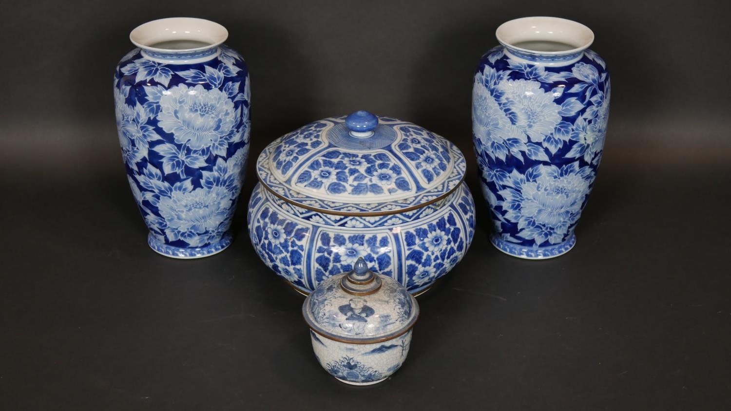 A pair of Chinese style baluster vases, a Chinese blue and white lidded tureen and a similar