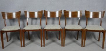 A set of five mid century vintage teak G-Plan bar back dining chairs with maker's label to the