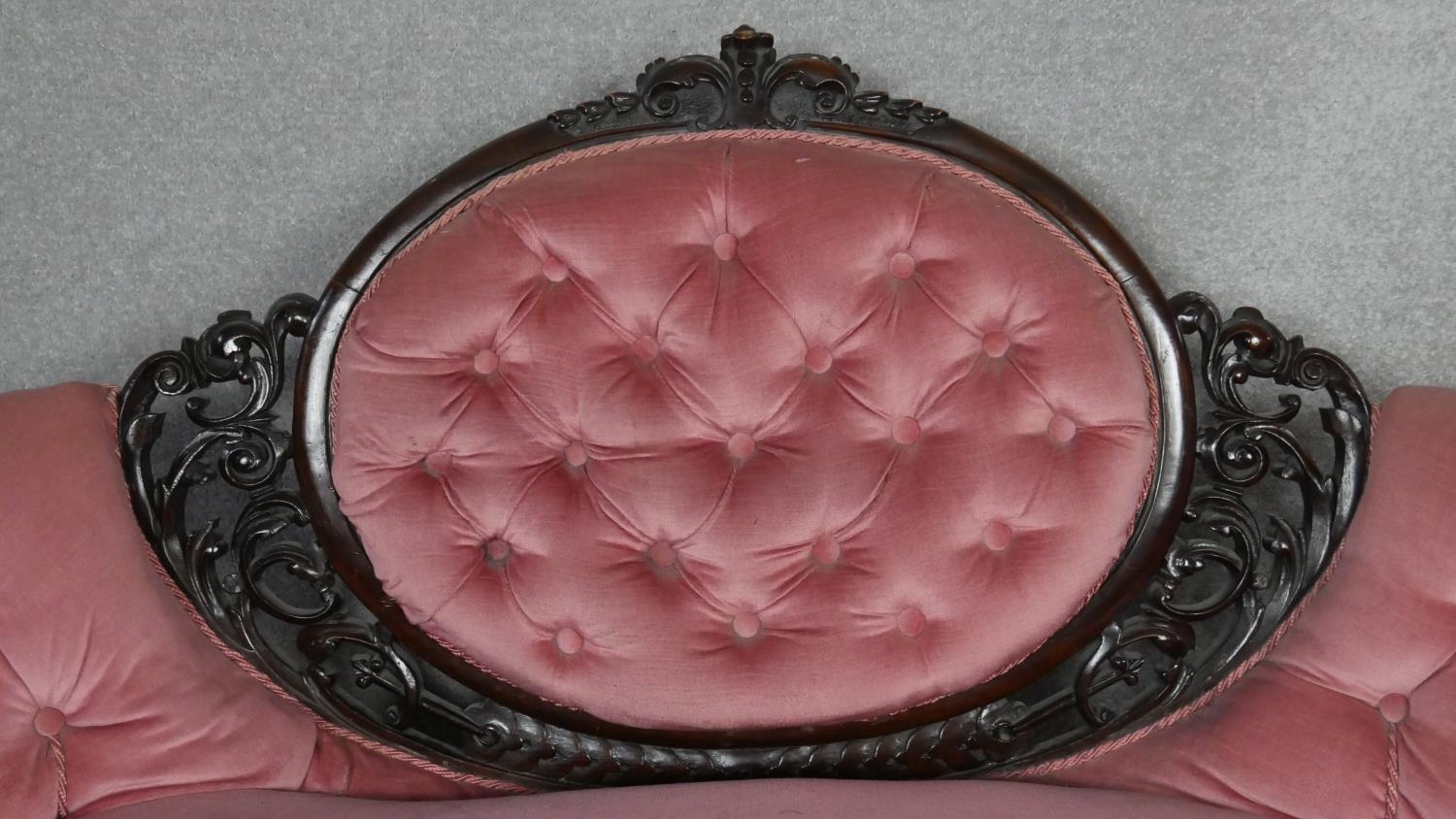 A Victorian carved walnut framed sofa in deep buttoned velour upholstery on fluted tapering - Image 2 of 6